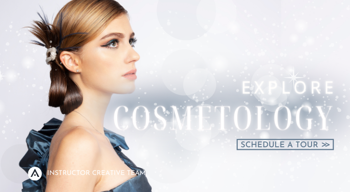 A holiday glam look by the AIP Creative Team with a sleek ribbon side bun and bold eyeliner makeup in a blue evening gown. Explore Cosmetology and schedule a tour.