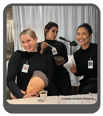 AIP students with their tools and mannequin heads