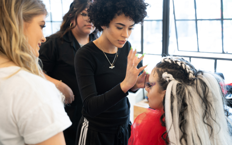 image of a student at Aveda Institute Portland in class showing why aip