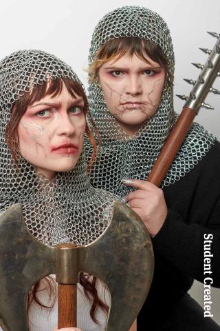 Image of two student models in medieval armor costumes