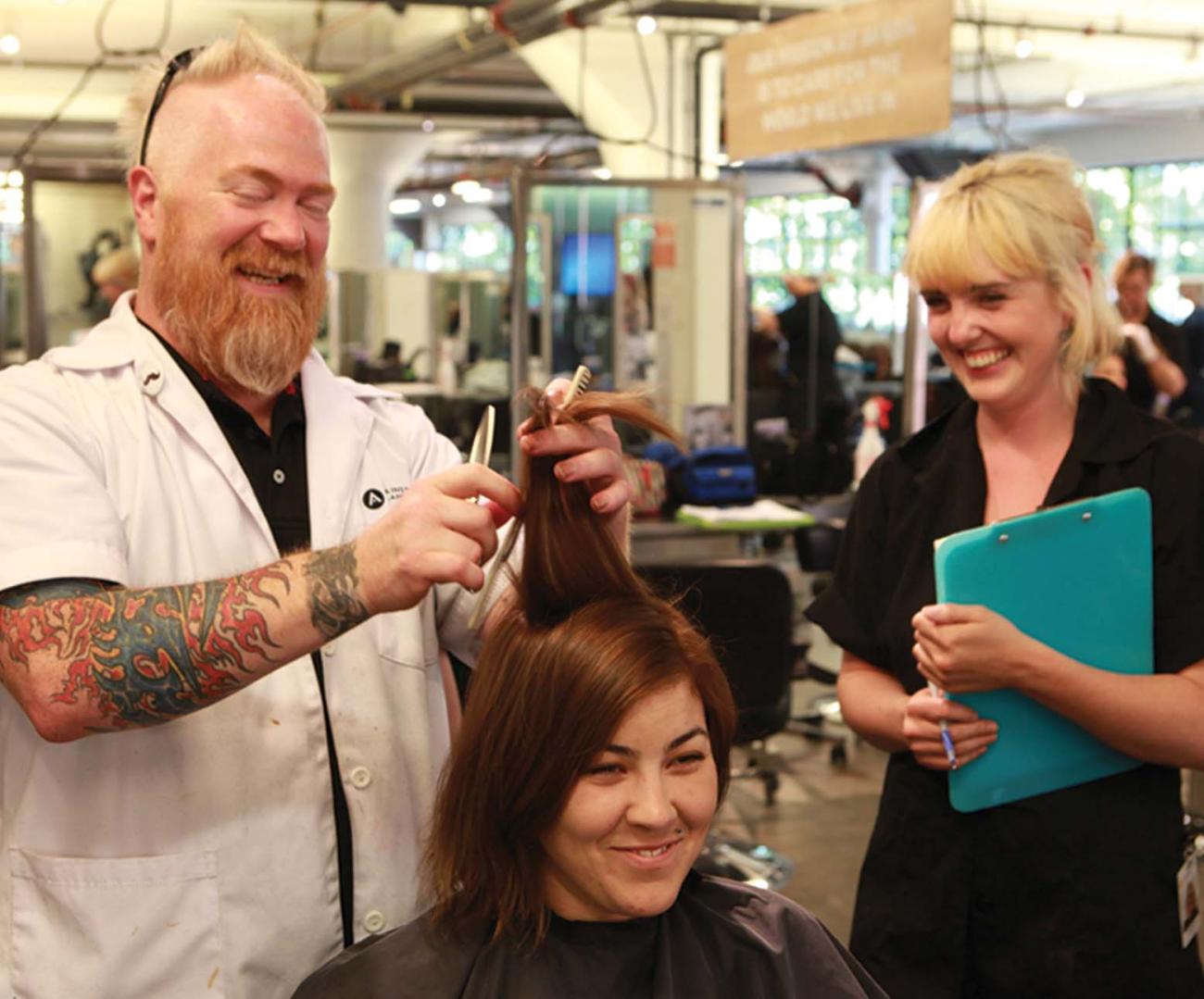 Image of instructor Brian Cline teaching hair cutting