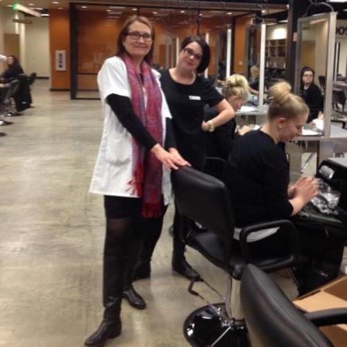Aveda Institute Portland instructor on the salon floor at the Vancouver campus