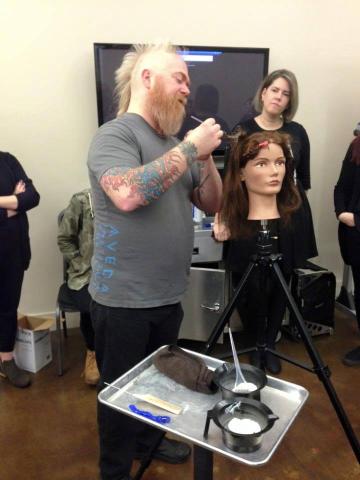 Instructor Brian doing hair